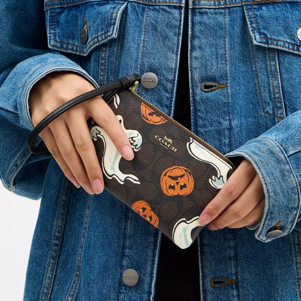 Coach Brown Wristlet with Ghost and Pumpkin Design